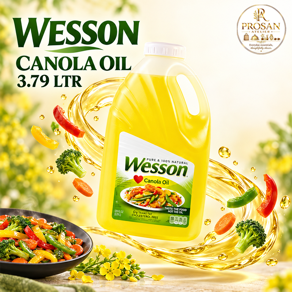 Large 3.79L bottle of Wesson Pure Canola Oil beside fresh cooking ingredients